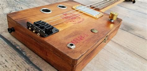 how to make an cigar box 3 string electric guitar|3 string solid body guitar.